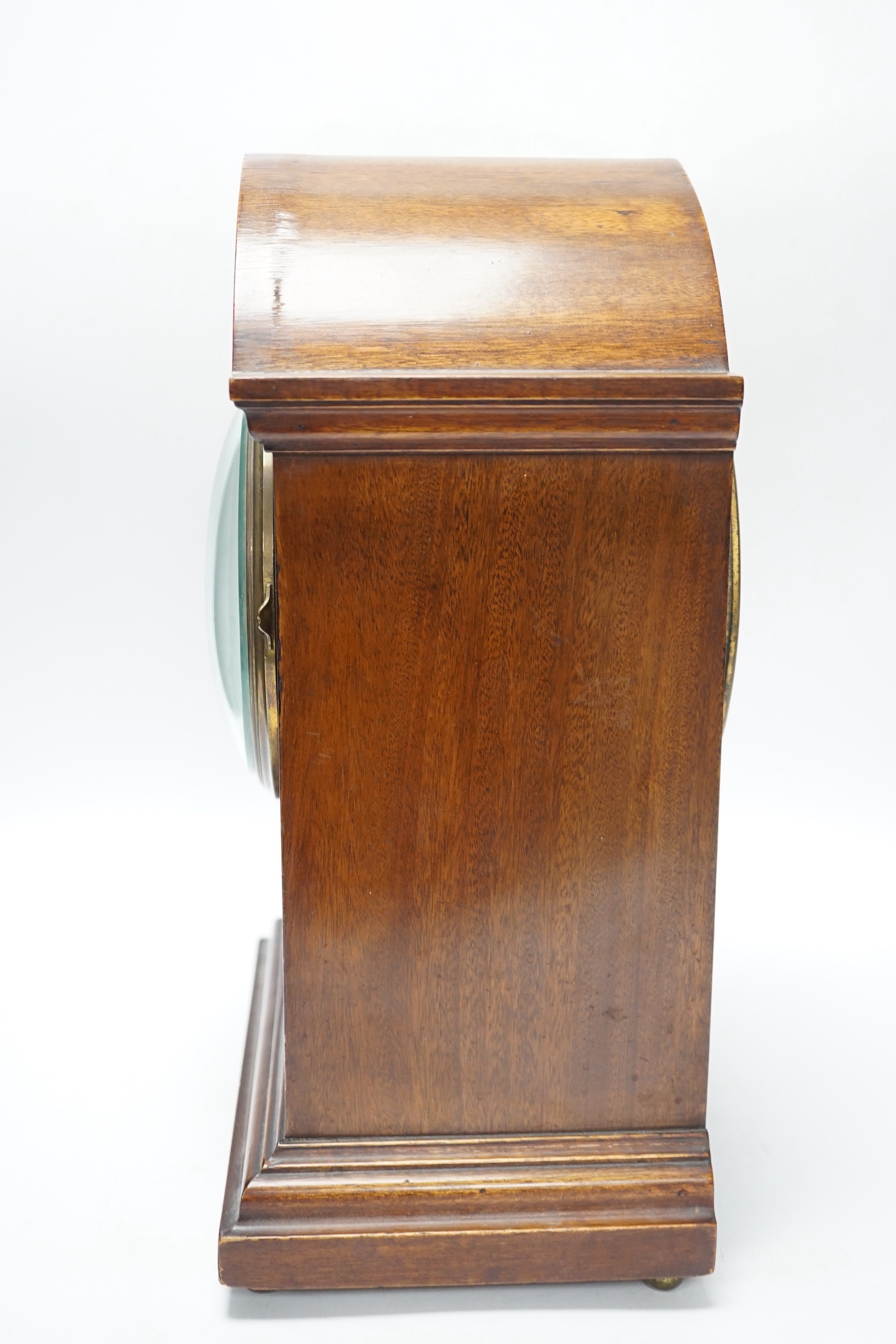 An Edwardian inlaid mahogany mantel clock striking on a coiled gong, 37cm